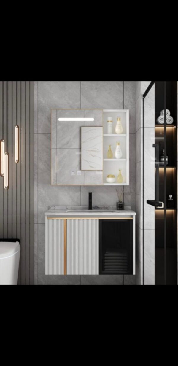 WHITE CABINET WITH GOLDEN HANDLE